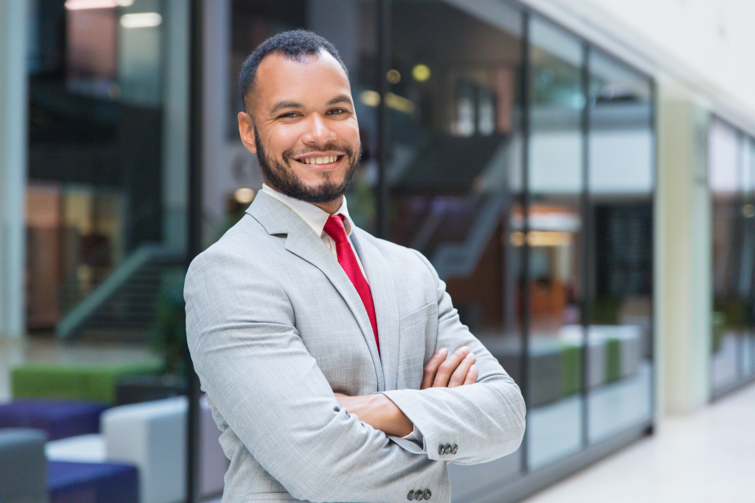 Cheerful businessman smiling at camera